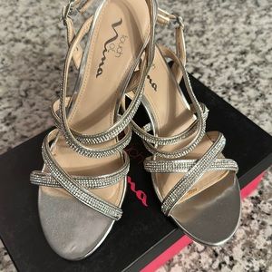 Touch of Nina- Gently used